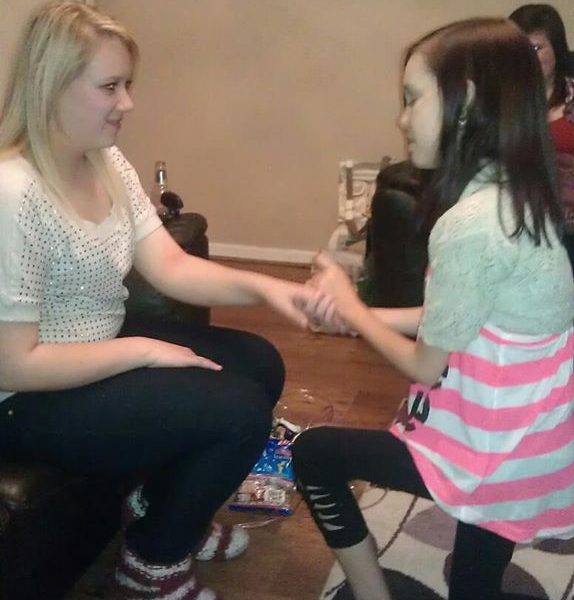 Lucy pretending to propose to our friend Vic