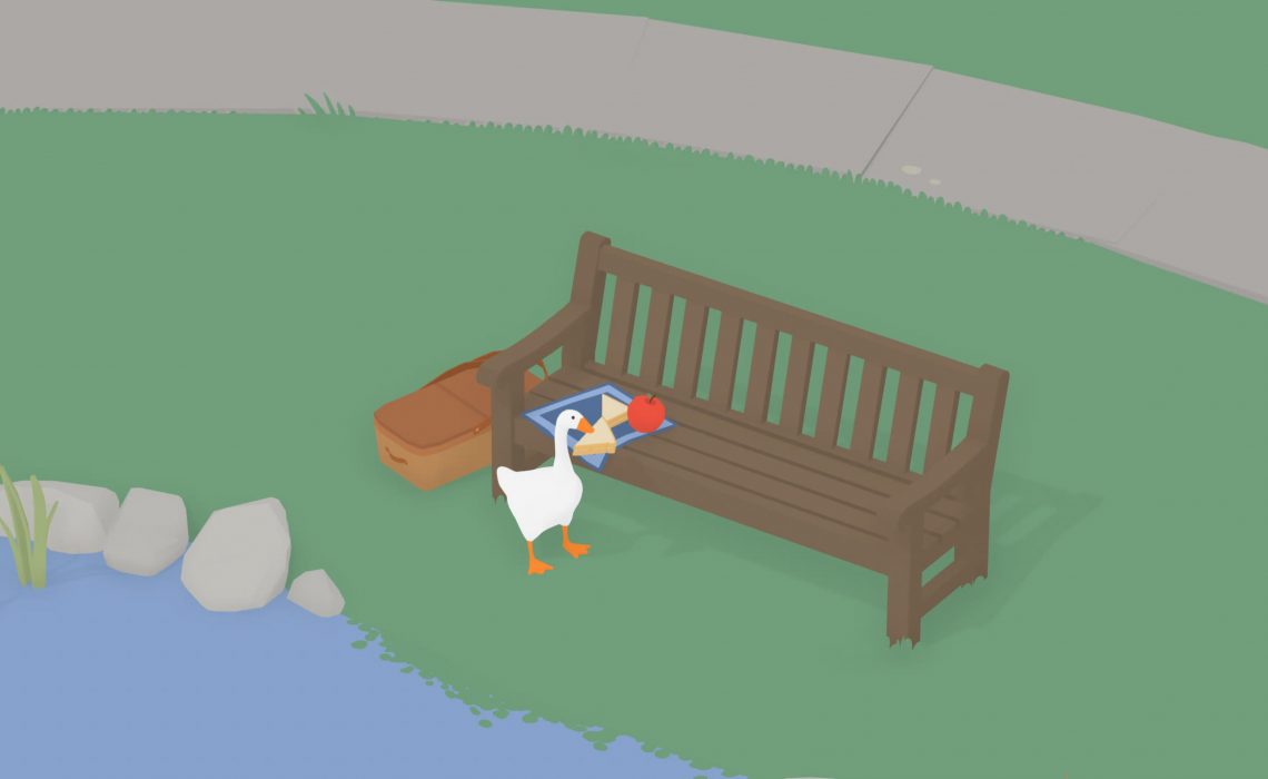 A cartoon image (Screenshot of the cosy game 'untitled goose game') of a goose trying to steal something from a bench that is sat on greenery in front of a little pond.